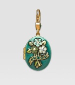 Emerald-colored CRYSTALLIZED - Swarovski Elements sparkle on this handcrafted, hand-enameled birthstone locket that opens to hold a favorite photo. Crystal Enamel 18k goldplated brass & brass-plated pewter Month indicated on the back Length, about 1¼ Width, about 1 Spring clip clasp Made in USA