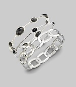 From the Rock Candy Collection. Faceted onyx stones lay stationary along a thin sterling silver band.Onyx Sterling silver Diameter, about 2½ x 2¼ Imported Please note: Bracelets sold separately. 