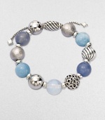 From the Elements Collection. Rich textures and soft shades combine in a stunning strand of 14mm sterling silver, blue chalcedony, aquamarine and moon quartz beads with a silver oval slide clasp.Blue chalcedony, aquamarine and moon quartzSterling silverDiameter, about 2Adjustable slide claspImported