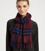 Luxurious cashmere wrap is adorned with an outstanding check design with fringe trim.Cashmere47 X 11Dry cleanImported