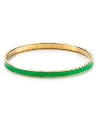 Go easy and green with this simply styled bangle from kate spade new york. Cast in glistening 12-karat gold, it's a stackable stroke of luck. Go easy and green with this simply styled bangle from kate spade new york. Cast in glistening 12-karat gold, it's a stackable stroke of luck.