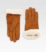 Genuine shearling cuffs perfectly complement these stylish suede gloves.Cashmere liningAbout 9 longImported