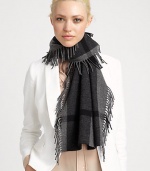 A large check pattern and fringed edges embellish this ultra-soft, woven wool and cashmere wrap.Wool/Cashmere18 X 61Dry cleanImported