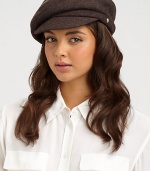 A warm, wool style in a slouchy design with logo detail.WoolAdjustable inner bandBrim, about 2Pindot linedSpot cleanImported