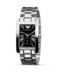 Emporio Armani classic-inspired stainless steel bracelet watch with rectangular-shaped black dial. Numbers displayed as Roman numerals. Second hand. Signature eagle logo detail. Emporio Armani classic-inspired stainless steel bracelet watch with rectangular-shaped black dial. Numbers displayed as Roman numerals. Second hand. Signature eagle logo detail.