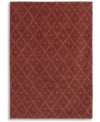 A subtle, hushed pattern of diamonds and dots against an exquisite chili pepper red ground enhances any decor with soft-textured style. This statement-making rug from Karastan is woven from 100% premium worsted 2-ply wool for a soft hand and long-lasting wear.