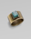 A structural piece with a square, center turquoise stone. TurquoiseBrassWidth, about ½Made in USA