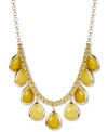 Soak up some sunny color. Haskell's frontal necklace brings focus to chartreuse acrylic beads in a teardrop design. A tonal cord intertwines with the box chain. Crafted in gold tone mixed metal. Approximate length: 17 inches + 3-inch extender. Approximate drop: 1-1/2 inches.