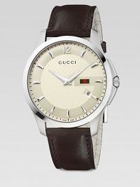 From the G-Timeless Collection. A beautiful blend of sleek stainless steel and supple leather to create a truly classic timepiece. Swiss quartz movementWater resistant to 5 ATMRound stainless steel case, 40mm (1.5)Smooth bezelDiamond patterned ivory dial with logo accentLuminous handsBar and numeric hour markersDate display at 4 o'clockDark brown leather strapMade in Switzerland From the G-Timeless Collection. A beautiful blend of sleek stainless steel and supple leather to create a truly classic timepiece. Swiss quartz movementWater resistant to 5 ATMRound stainless steel case, 40mm (1.5)Smooth bezelDiamond patterned ivory dial with logo accentLuminous handsBar and numeric hour markersDate display at 4 o'clockDark brown leather strapMade in Switzerland