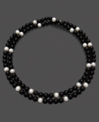 Let the sheer beauty of black and white enchant any outfit. This necklace features luminous cultured freshwater pearls (8-9 mm) and onyx (8-9 mm). Approximate length: 36 inches. Let the sheer beauty of black and white enchant any outfit. This necklace features luminous cultured freshwater pearls (8-9 mm) and onyx (8-9 mm). Approximate length: 36 inches.