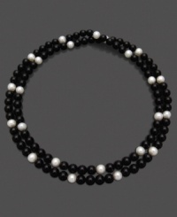 Let the sheer beauty of black and white enchant any outfit. This necklace features luminous cultured freshwater pearls (8-9 mm) and onyx (8-9 mm). Approximate length: 36 inches.