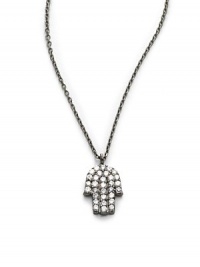 THE LOOKFrom the Fearless Eye CollectionBlack rhodium-tone chain and pendantClear Cubic Zirconia hand pendantSpring ring closureTHE FITChain, about 16 longTHE MATERIALSterling silverCubic ZirconiaORIGINImported THE LOOKFrom the Fearless Eye CollectionBlack rhodium-tone chain and pendantClear Cubic Zirconia hand pendantSpring ring closureTHE FITChain, about 16 longTHE MATERIALSterling silverCubic ZirconiaORIGINImported