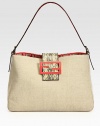 A classic, structured shape crafted in smooth canvas and ultra-luxe python, finished with a signature logo interior. Adjustable python shoulder strap, 8½-10½ dropPython snap closureOne inner zip compartmentOne inside zip pocketLinen lining14W X 9½H X 5½DMade in Italy