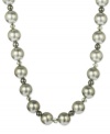 A splendid mix of shimmer. This stunning necklace combines shell beads (14 mm), sparkling hematite (34-3/4 ct. t.w.) and Swarovski Elements. Set in sterling silver.  Approximate length: 18 inches.