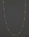 Diamond stations shine on a delicate rose gold necklace.