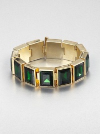 From the Cocktail Collection. Bold faceted stones of rich emerald-colored glass sit all in a row in this striking design of polished goldtone.GlassGoldtoneLength, about 7Width, about .75Bar claspImported From the Cocktail Collection. Bold faceted stones of rich emerald-colored glass sit all in a row in this striking design of polished goldtone.GlassGoldtoneLength, about 7Width, about .75Bar claspImported