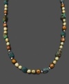 Natural metallics and semi-precious stones add alluring natural beauty to this necklace. In sterling silver with baroque freshwater pearl (7-8 mm) and turquoise (7-9 mm). Necklace can be worn doubled. Measures approximately 36 inches long.