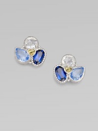 From the Prism Collection. A cluster of blue quartz and corundum and crystal richly framed in sterling silver.Blue quartz, blue corundum, and crystal Sterling silver Length, about ½ Post and butterfly backs Imported