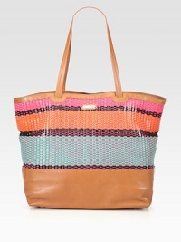 A roomy carryall with a brightly colored woven pattern in luxurious leather.Double shoulder strap, 10 dropOpen topProtective metal feetThree inner compartmentsOne inside zip pocketTwo inside open pocketsCotton lining18¼W X 13H X 6½DImported A roomy carryall with a brightly colored woven pattern in luxurious leather.Double shoulder strap, 10 dropOpen topProtective metal feetThree inner compartmentsOne inside zip pocketTwo inside open pocketsCotton lining18¼W X 13H X 6½DImported