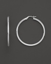 Classic, gleaming circles of 18K yellow gold from Roberto Coin.