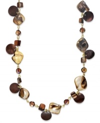Shift into neutrals. Brown shells and topaz plastic beads adorn this bohemian-chic long necklace by Style&co. Crafted in gold tone mixed metal. Approximate length: 43 inches. Shift into neutrals. Brown shells and topaz plastic beads adorn this bohemian-chic long necklace by Style&co. Crafted in gold tone mixed metal. Approximate length: 43 inches.