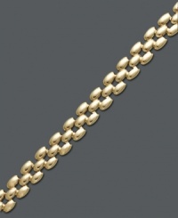 Elevate your style status with this luxurious bracelet. Crafted in 14k gold, bracelet features an intricate status link presentation. Approximate length: 7-1/4 inches. Elevate your style status with this luxurious bracelet. Crafted in 14k gold, bracelet features an intricate status link presentation. Approximate length: 7-1/4 inches.