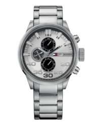 Mission accomplished. This watch by Tommy Hilfiger is ready for action. Stainless steel bracelet and round case. Silver tone dial features applied stick indices and numerals, minute track, date window at three o'clock, three black multifunctional subdials, three hands and logo. Quartz movement. Water resistant to 50 meters. Ten-year limited warranty. Mission accomplished. This watch by Tommy Hilfiger is ready for action. Stainless steel bracelet and round case. Silver tone dial features applied stick indices and numerals, minute track, date window at three o'clock, three black multifunctional subdials, three hands and logo. Quartz movement. Water resistant to 50 meters. Ten-year limited warranty.