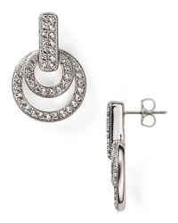 Ethereal pavé-crystals romance this pair of Nadri drop earrings, crafted from rhodium-plated metal. Ethereal pavé-crystals romance this pair of Nadri drop earrings, crafted from rhodium-plated metal.