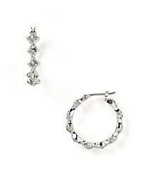 Eye-catching crystal stones and a unique shape give these small hoop earrings from Lauren Ralph Lauren added allure. Eye-catching crystal stones and a unique shape give these small hoop earrings from Lauren Ralph Lauren added allure.