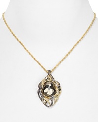 Blending fantasy and Art Nouveau influences, this Alexis Bittar necklace features an intricately sculpted gold pendant that is adorned in a mix of pyrite stones and crystals. Blending fantasy and Art Nouveau influences, this Alexis Bittar necklace features an intricately sculpted gold pendant that is adorned in a mix of pyrite stones and crystals.