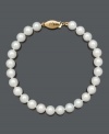 Give her the gift of everlasting luxury. This classic bracelet features AA Akoya cultured pearls (6-6-1/2 mm) and a 14k gold clasp. Approximate length: 7-1/2 inches.