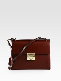 A boxy frame in luxuriously smooth leather with goldtone signature hardware.Top handles, 1 dropDetachable shoulder strap, 11½ dropFlip-lock flap closureOne open pocket under flapThree inner compartmentsFully lined10½W X 8H X 3DMade in Italy A boxy frame in luxuriously smooth leather with goldtone signature hardware.Top handles, 1 dropDetachable shoulder strap, 11½ dropFlip-lock flap closureOne open pocket under flapThree inner compartmentsFully lined10½W X 8H X 3DMade in Italy