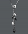 Chic contrasting colors. White agate (7 mm x 12 mm) and black onyx (8 mm x 20 mm) in pretty leaf shapes dangle from this y-shaped pendant necklace. Crafted in sterling silver. Approximate length: 18 inches. Approximate drop: 2 inches.