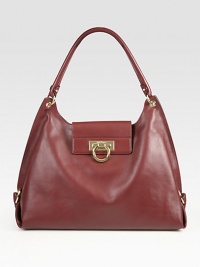 A slouchy carryall of ultra-smooth Italian leather, finished with polished metal hardware. Top handle, 8 dropFlap-lock closureProtective metal feetOne inside zip pocketTwo inside open pocketsFully lined14W X 10H X 5½DMade in Italy A slouchy carryall of ultra-smooth Italian leather, finished with polished metal hardware. Top handle, 8 dropFlap-lock closureProtective metal feetOne inside zip pocketTwo inside open pocketsFully lined14W X 10H X 5½DMade in Italy