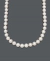 Embrace iconic style with timeless pearls. Belle de Mer's smooth strand of cultured freshwater pearls (12-1/2-13-1/2 mm) has a 14k gold clasp. Approximate length: 17 inches.