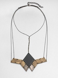 From the Facet Collection. This head-turning statement necklace suspends a grouping of diamond-shaped discs of antiqued and powder-coated brass from a network of gunmetal chains.BrassLength, about 14½Lobster claspMade in USA From the Facet Collection. This head-turning statement necklace suspends a grouping of diamond-shaped discs of antiqued and powder-coated brass from a network of gunmetal chains.BrassLength, about 14½Lobster claspMade in USA
