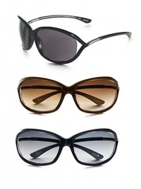Sleek plastic frames hold floating lens. Available in black with smoke lens and silver temple, dark brown with brown gradient lens and gold temple, or dark grey with grey lens and gold temple. UV 400 lens 100% UV protection Made in Italy Sleek plastic frames hold floating lens. Available in black with smoke lens and silver temple, dark brown with brown gradient lens and gold temple, or dark grey with grey lens and gold temple. UV 400 lens 100% UV protection Made in Italy