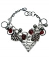 Even more to love. This charm bracelet from GUESS is crafted from silver-tone and hematite-tone mixed metal with heart charms featuring stunning Siam red stones. Item comes packaged in a signature GUESS Gift Box. Approximate length: 7-1/2 inches. Approximate drop: 1 inch. Approximate diameter: 1-1/2 inches.