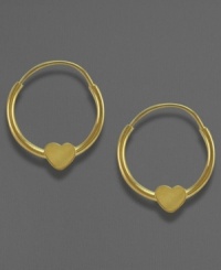 A sweet touch for the little princess, fit for every day. These lovely earrings are crafted of 14k gold and measure approximately 1/8 inch in diameter. A sweet touch for the little princess, fit for every day. These lovely earrings are crafted of 14k gold and measure approximately 1/8 inch in diameter.