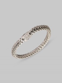 Chunky links are clasped with a glamorous pavé closure. Diamond, 0.30 tcw 18k white gold 7½ long Spring lock closure Made in Bali Chunky links are clasped with a glamorous pavé closure. Diamond, 0.30 tcw 18k white gold 7½ long Spring lock closure Made in Bali