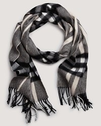 Bundle up in Burberry's soft cashmere scarf with signature giant check print. Bundle up in Burberry's soft cashmere scarf with signature giant check print.