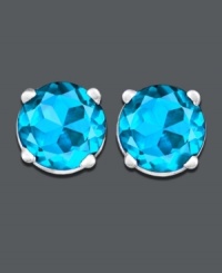 Refresh your look with a bright splash of blue. Earrings feature round-cut blue topaz (1 ct. t.w.) in a 14k white gold post setting. Approximate diameter: 1/4 inch. Refresh your look with a bright splash of blue. Earrings feature round-cut blue topaz (1 ct. t.w.) in a 14k white gold post setting. Approximate diameter: 1/4 inch.