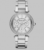 From the Parker Collection. Truly sparkle in this technical timepiece with Swarovski crystal accents. Quartz movementWater resistant to 10 ATMRound stainless steel case, 33mm (1.3) Swarovski crystal accented bezelSilvertone dialNumeric and Swarovski crystal hour markersThree multi-function sub-dialsSecond hand Stainless steel link braceletImported