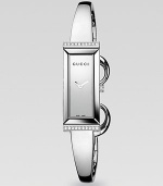 From the G-Frame Collection. A streamlined stainless steel timepiece with diamond and horsebit accents.Quartz movement Water resistant to 3 ATM Rectangular stainless steel case, 34mm x 14mm, (1.33 x .55) Sapphire crystal Diamonds along top and bottom case, 0.10 tcw Stainless steel bangle Jewelry clasp closure Made in Switzerland 