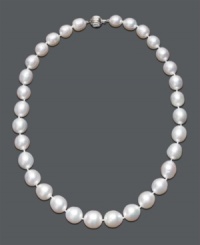 The gift of a lifetime -- elegant pearls are a timeless tradition. This polished strand features graduated, cultured South Sea pearls (10-13 mm) with a 14k white gold clasp. Approximate length: 18 inches. The gift of a lifetime -- elegant pearls are a timeless tradition. This polished strand features graduated, cultured South Sea pearls (10-13 mm) with a 14k white gold clasp. Approximate length: 18 inches.