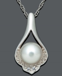 Proper etiquette. This prim and poised pendant features a timeless, diamond-accented teardrop design cradling a cultured freshwater pearl (7-8 mm). Set in sterling silver. Approximate length: 18 inches. Approximate drop: 3/4 inch. Proper etiquette. This prim and poised pendant features a timeless, diamond-accented teardrop design cradling a cultured freshwater pearl (7-8 mm). Set in sterling silver. Approximate length: 18 inches. Approximate drop: 3/4 inch.