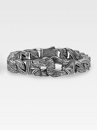 Woven sterling silver is handsomely engraved and styled with the Guardian center link accent across the front. 18K gold accent dual-locking clasp About 8½ long Made in USA Woven sterling silver is handsomely engraved and styled with the Guardian center link accent across the front. 18K gold accent dual-locking clasp About 8½ long Made in USA