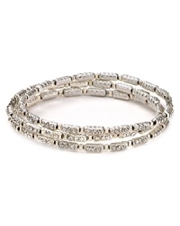 The Seasonal Whispers girl loves to stack the brand's beautifully eclectic bracelets. This set is studded with matte Swarovski crystal bars, creating a cool textured statement. The Seasonal Whispers girl loves to stack the brand's beautifully eclectic bracelets. This set is studded with matte Swarovski crystal bars, creating a cool textured statement.