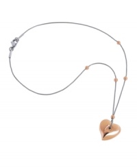 Make a sweet statement in this romantic heart pendant by Breil. Necklace features a stainless steel chain and lobster clasp closure with a rose gold ion-plated stainless steel heart and beaded accents. Approximate length: 17 inches. Approximate drop: 3/4 inch. Make a sweet statement in this romantic heart pendant by Breil. Necklace features a stainless steel chain and lobster clasp closure with a rose gold ion-plated stainless steel heart and beaded accents. Approximate length: 17 inches. Approximate drop: 3/4 inch.