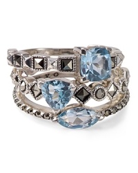 Designed to be stacked, this Judith Jack ring set flaunts edge-right allure, crafted of sterling silver and blue topaz stones. Designed to be stacked, this Judith Jack ring set flaunts edge-right allure, crafted of sterling silver and blue topaz stones.
